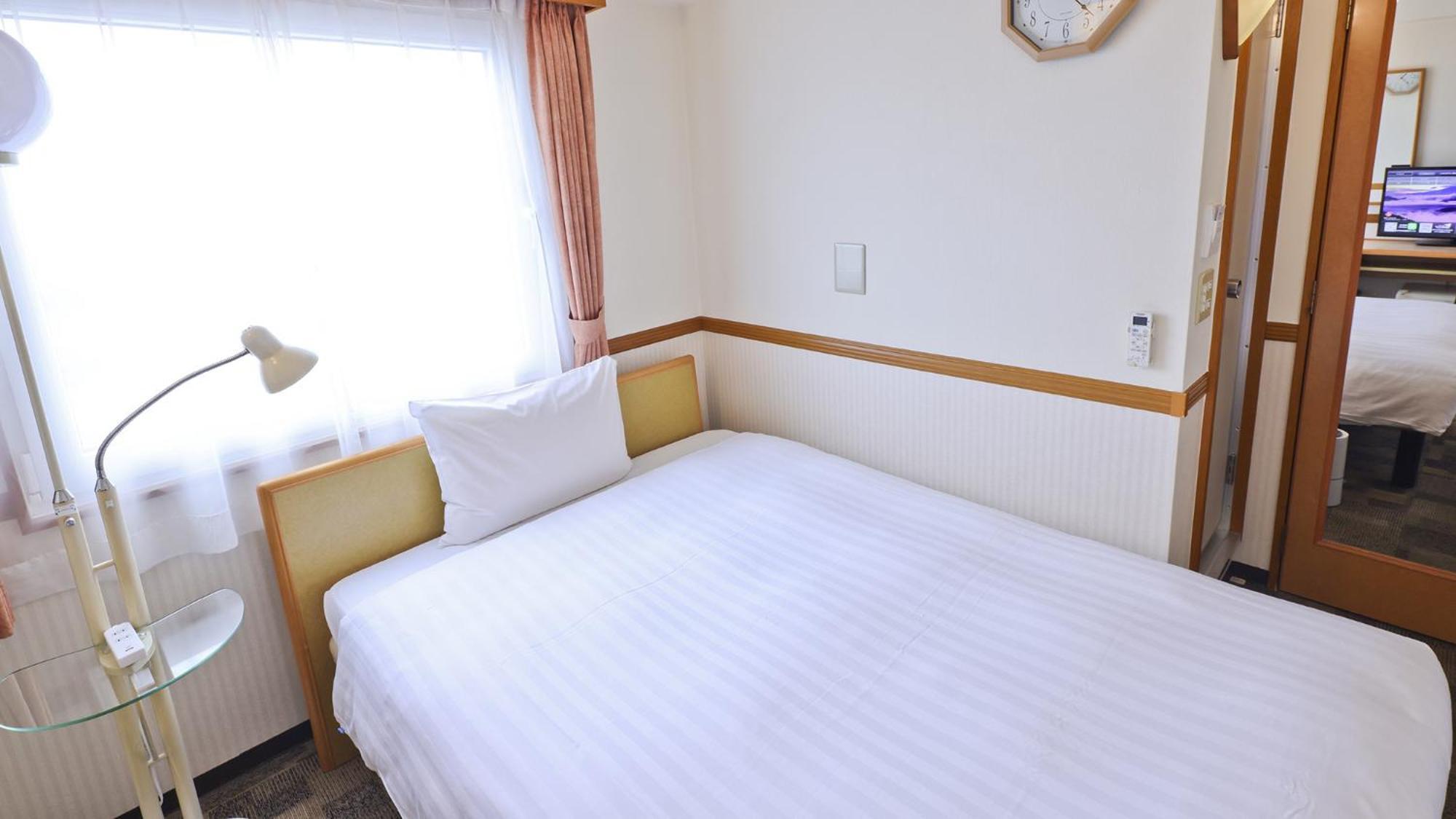 Toyoko Inn Fujisan Numazu Eki Kita Guchi No 2 Rum bild